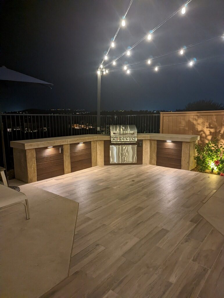 Roberts Residence &mdash; Outdoor kitchen and bar with a stone front