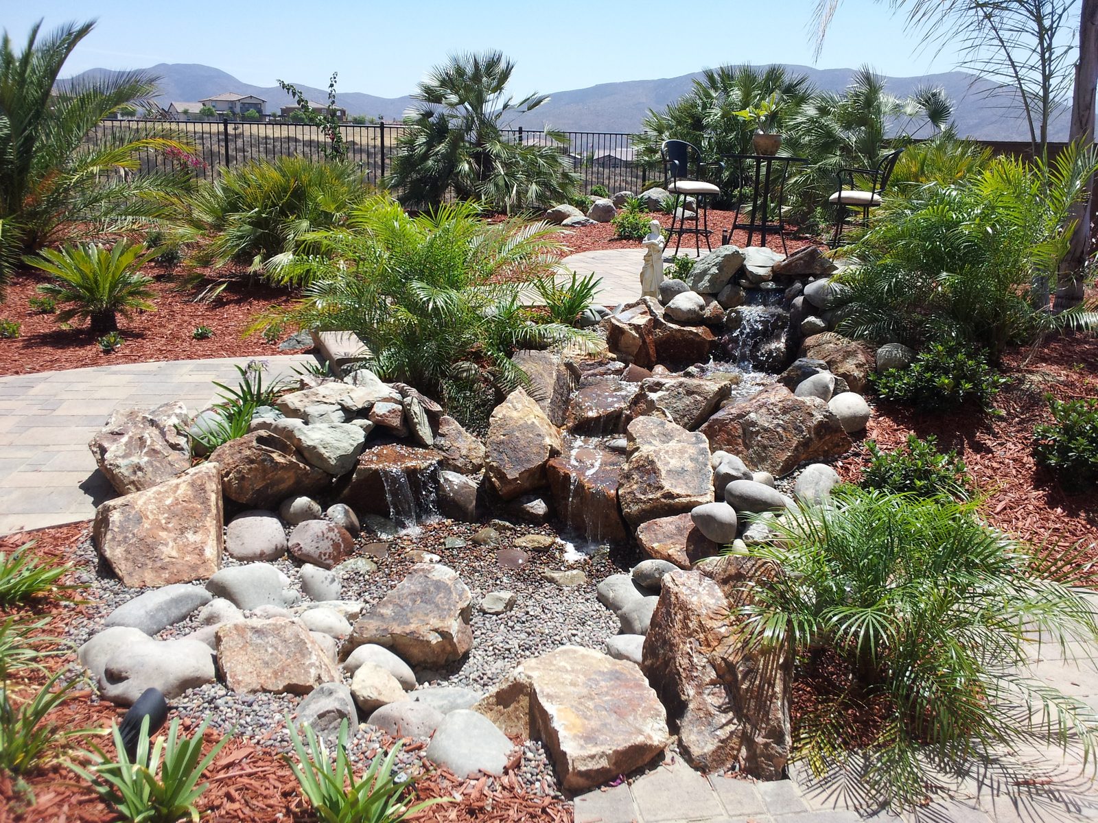 Russel Residence &mdash; Boulder waterfall and dry-creek run with the view