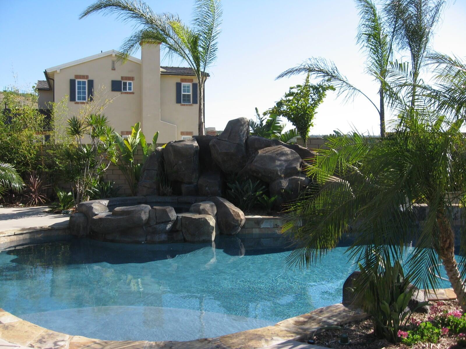 Quinn Residence — pool with boulder grotto